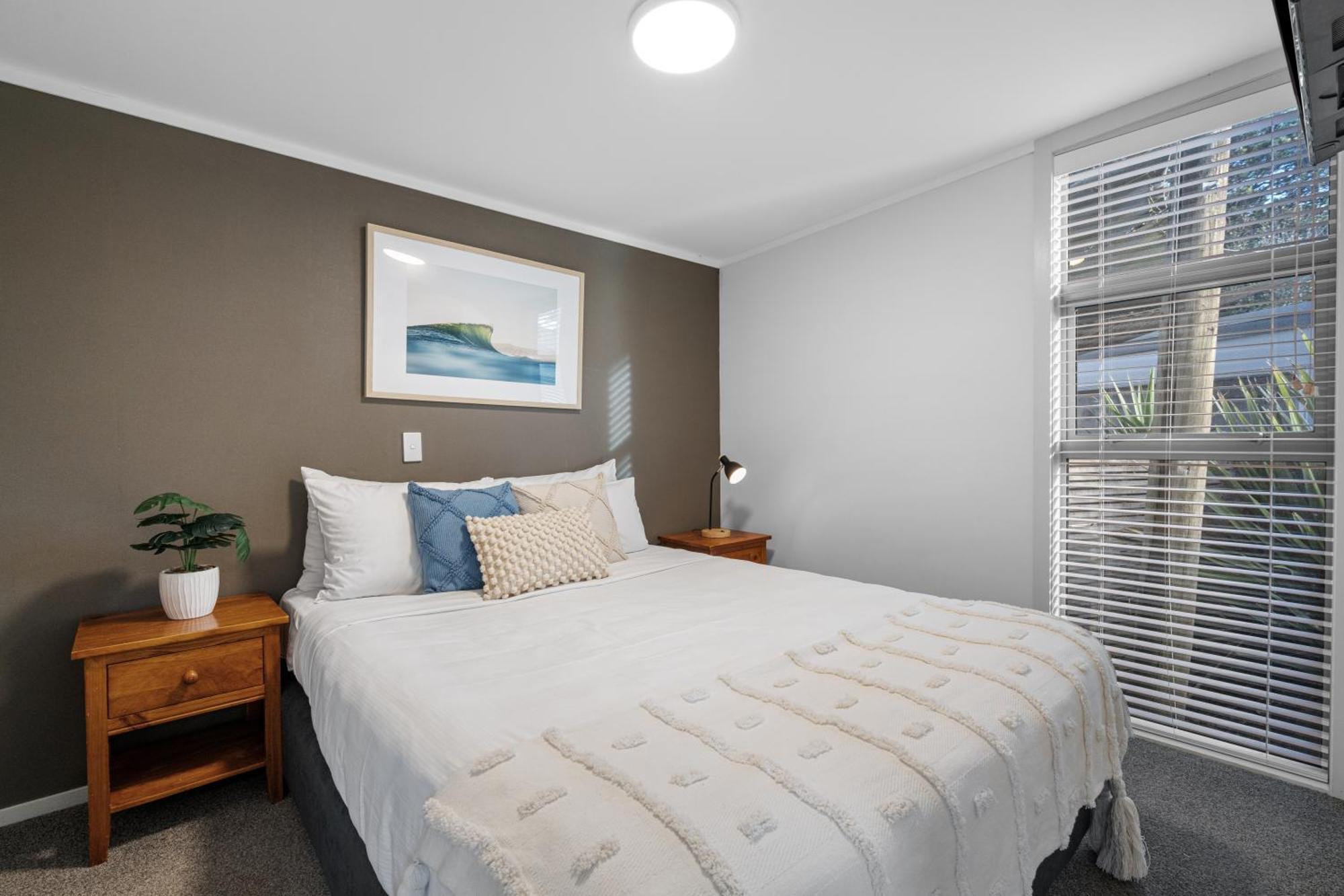 Tasman Holiday Parks - Waihi Beach 外观 照片 A bedroom in a typical apartment